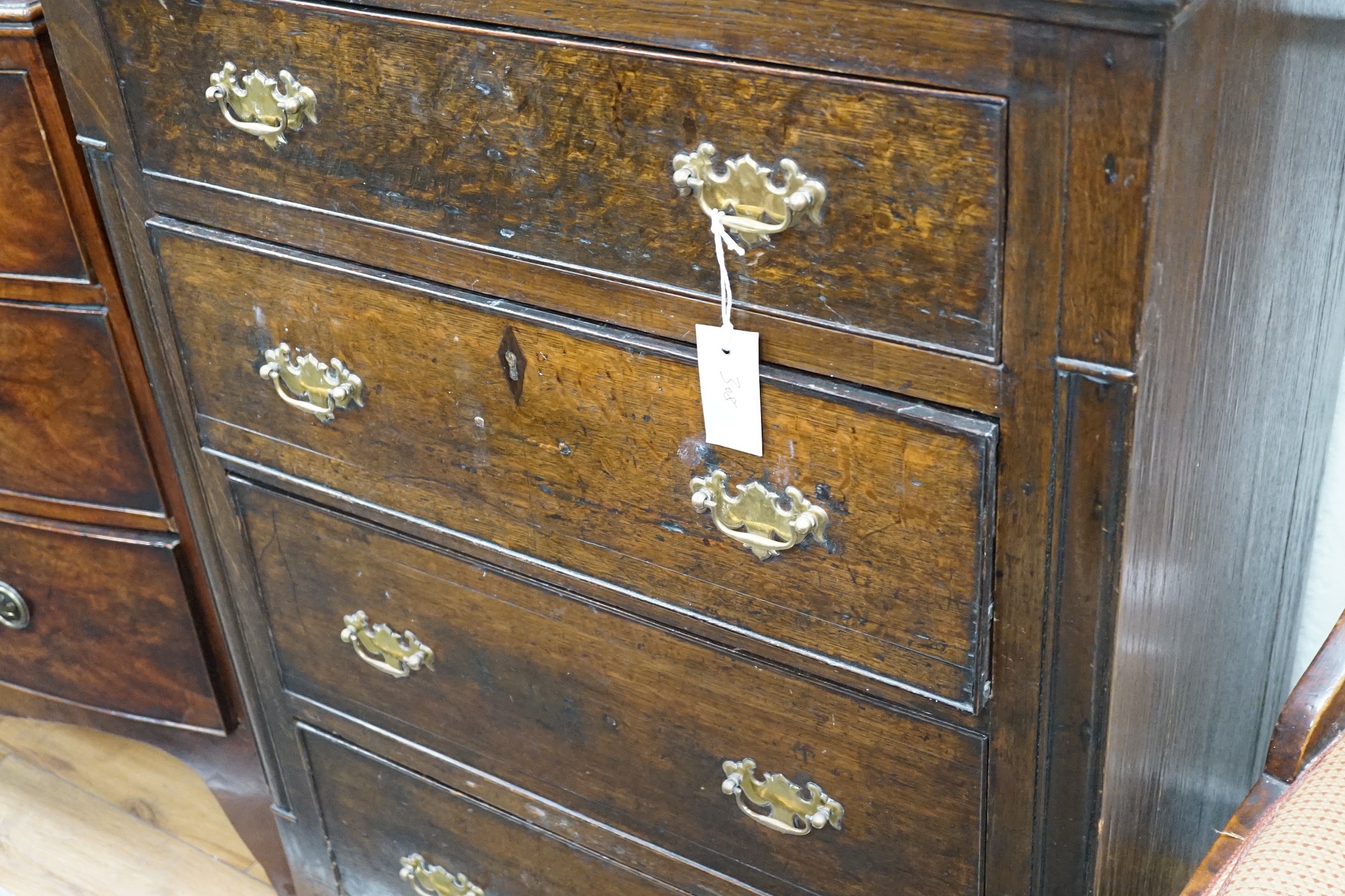 An 18th century style oak four drawer chest, width 75cm *Please note the sale commences at 9am.